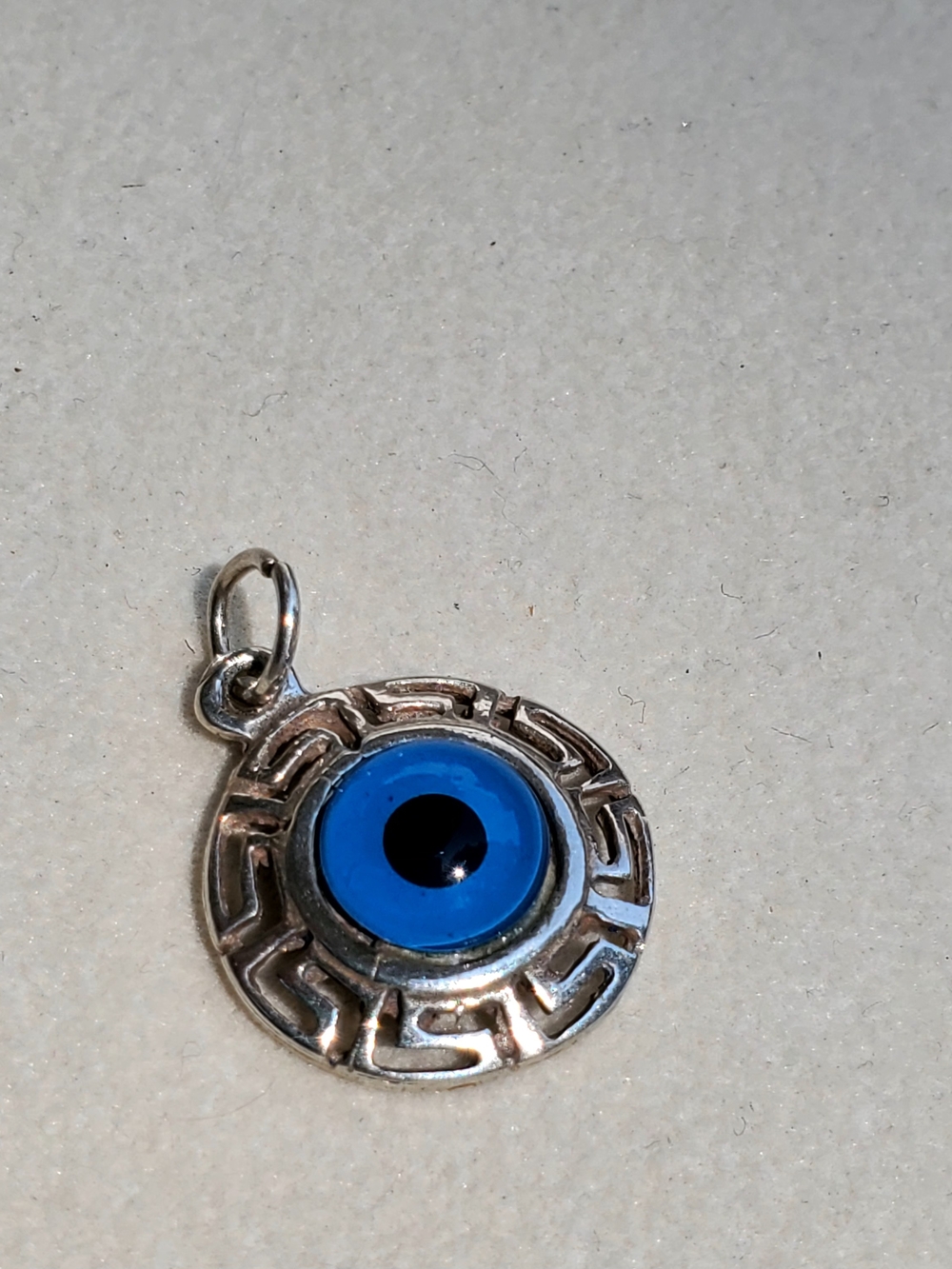 Silver Evil Eye Charm with Bright Blue Center